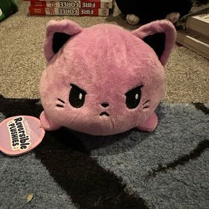Reversible cat plush